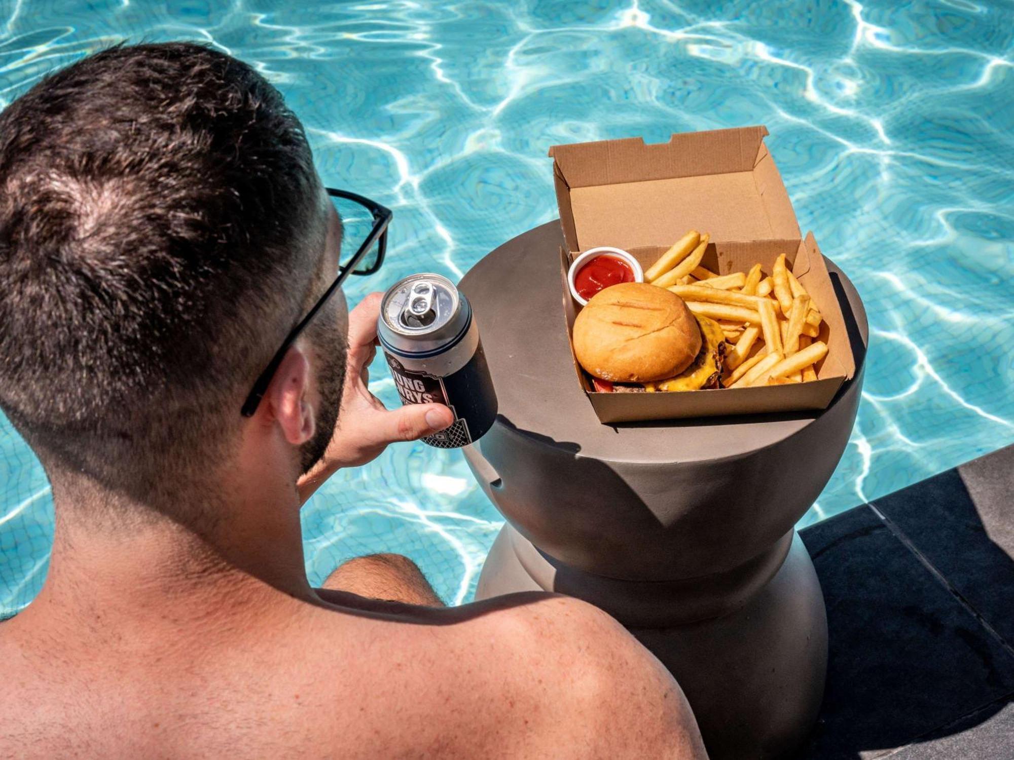 فندق بولمان سيدني هايد بارك المظهر الخارجي الصورة A floating drink and food holder